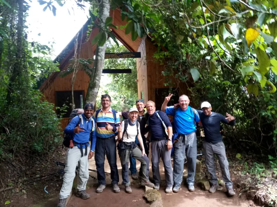 KCA guides and climbers at the forest gate